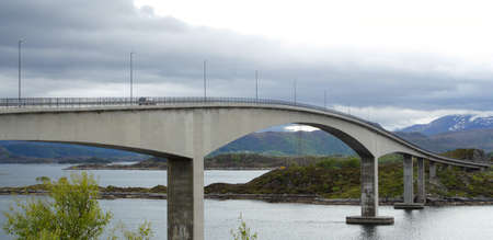 high bridge and mountains in the distance, norwayの写真素材