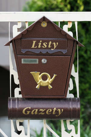 letter-box on a white wallの写真素材