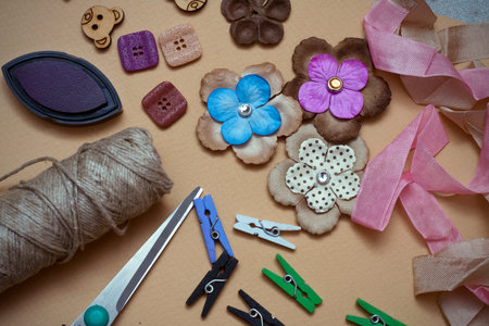 hand made scrapbooking post card and tools lying on a table