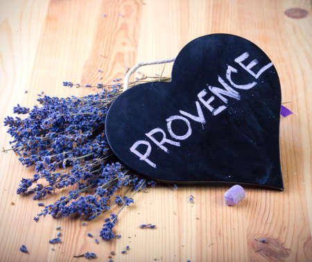 board as heart shape for records with flowersの写真素材