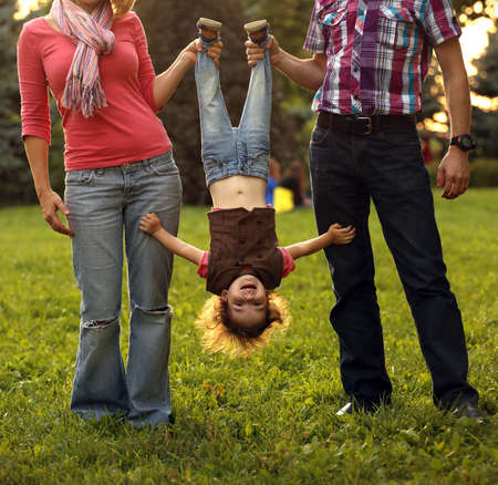 family with daughter at the parkの写真素材