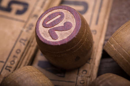 old wooden lotto barrels and game cardsの写真素材