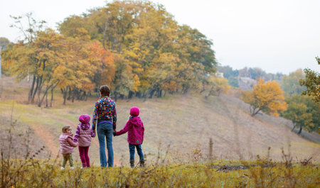 four little girl  outdoors 