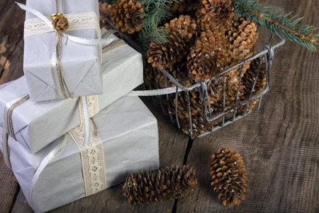 Christmas backgrounds. Gifts and Christmas decor on the wooden background.の写真素材