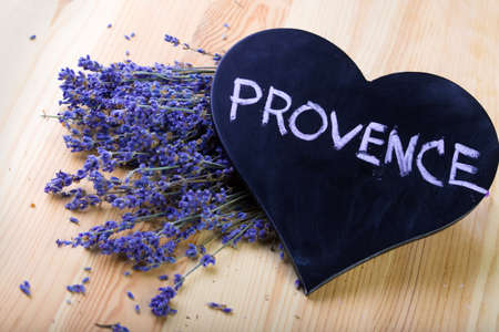 board as heart shape for records with flowersの写真素材