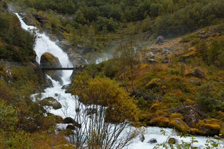 beautiful powerful waterfall in Norwayの写真素材