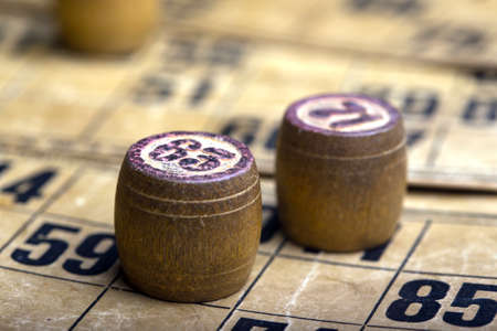 old wooden lotto barrels and game cardsの写真素材