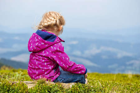 tourist girl and mountain viewsの写真素材