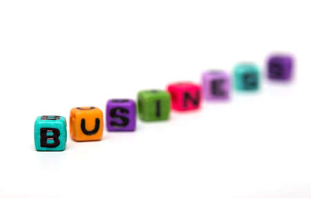 business - word made from multicolored child toy cubes with lettersの写真素材