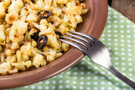 cauliflower in  at the wooden tableの写真素材