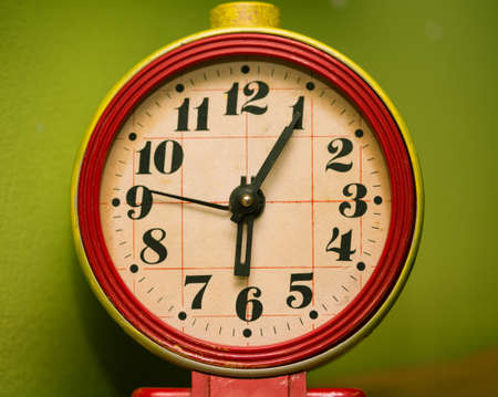 old rusty alarm clock face close upの写真素材