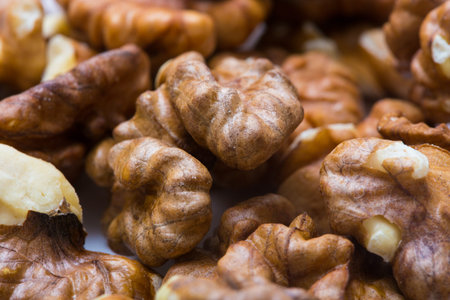 group of shelled walnuts close up backgroundの写真素材