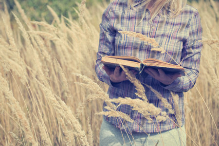 girl with book at the outdoor