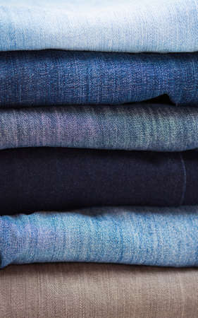 background Jeans folded in a heapの写真素材