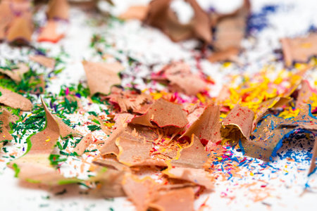 multicolored pencils and shavings on a paper