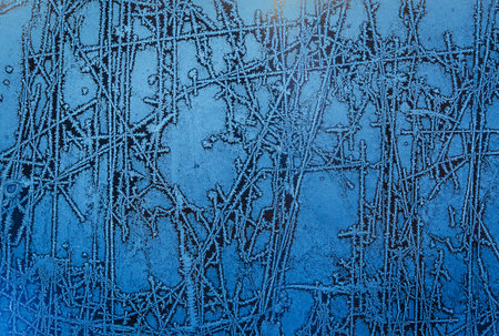background made of winter frozen window glass