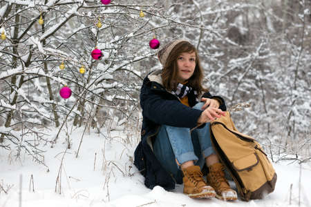 teen girl on a winter walk on a snowy day, Christmasの写真素材