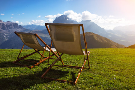 relax - two chairs in the mountains. Seceda Dolomites,  Italy.の写真素材