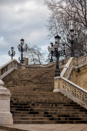 old beautiful staircase and lantern in the city of Bologna, Italyの写真素材