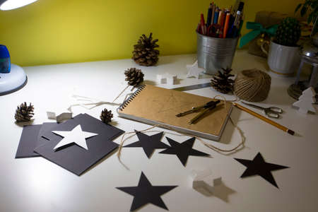 Christmas decorations. manufacturing garlands stars. materials and toolsの写真素材