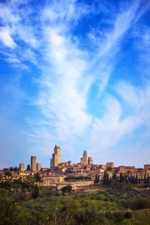 view of the old town San Gimignano and its towers at the  province of Siena. Tuscany, Italyの写真素材