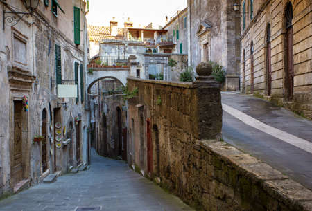 View of the streets in the old  famous tuff city of Sorano, province of Siena. Tuscany, Italyの写真素材
