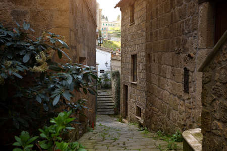 View of the streets in the old  famous tuff city of Sorano, province of Siena. Tuscany, Italyの写真素材