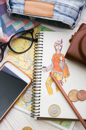 background - what to take for a trip.  clothes, shoes, money, map, camera, accessories, sunglasses,...