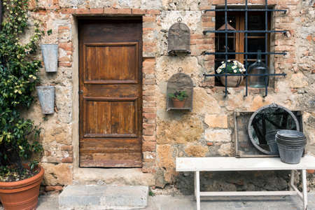 old door ar the streets of ancient small italian town. Tuscany, Italyの写真素材