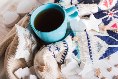 cup of coffee and Christmas decorationsの写真素材