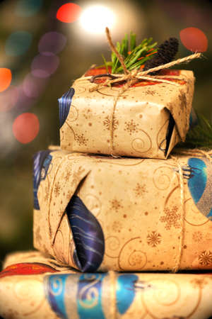 Christmas backgrounds. Gifts and Christmas decor on the wooden background.
の写真素材