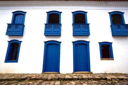 bright blue facade of house at the Parati Brazilの写真素材