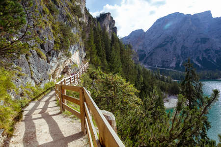 walking trail around the Braies lake, Dolomites Italyの写真素材