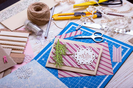 scrapbook background. christmas card and tools with decoration 
の写真素材