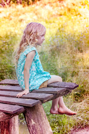 little girl in the forest, summerの写真素材