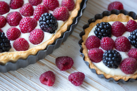 Delicious, useful and beautiful tartlets with raspberry and blackberry