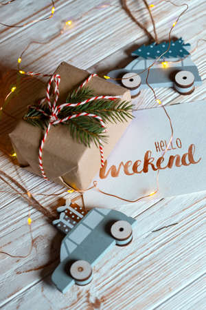 christmas. New Year's toys, gift  and inscription hello weekend on the background of the Christmas tree
の写真素材