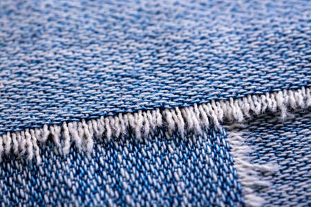 background made of old jeans rags close upの写真素材