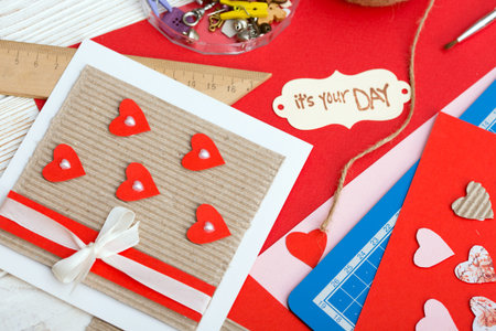 scrapbook background. Card and tools with decoration. valentine's day