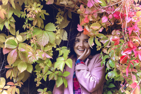 portrait of a beautiful happy smiling girl at the outdoor. Autumn