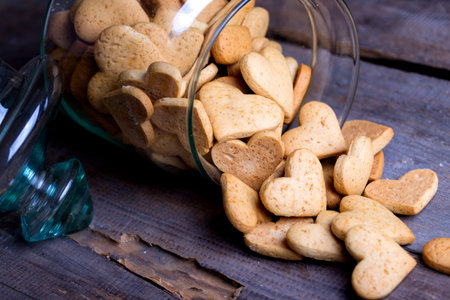 gingerbread in heart shape in a glass jarの写真素材