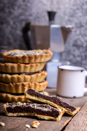 homemade baking - tartlets with salted caramel and chocolateの写真素材