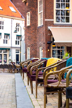 beautiful cafe on the street of the European city. tables and chairs on the streetの写真素材