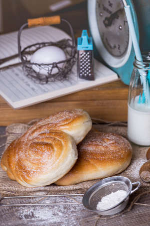 delicious appetizing buns and coffee for breakfastの写真素材