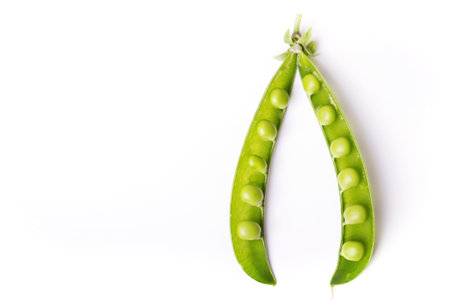green peas on a white background. raw diet
