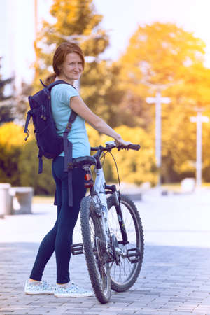 girl on a bicycle in the parkの写真素材