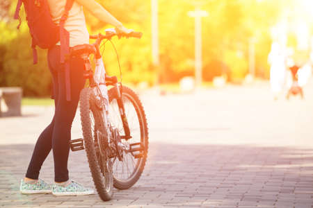 girl on a bicycle in the parkの写真素材