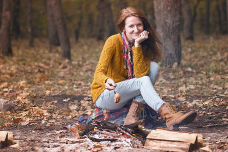 girl on picnic in the autumn forestの写真素材