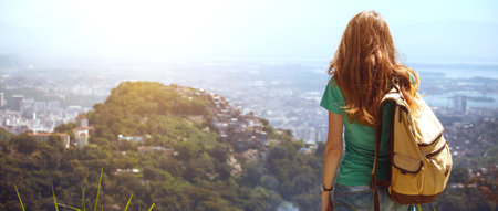 girl tourist with a backpack on the background Rio de Janeiro