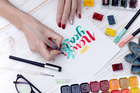 girl makes the inscription  -  happy New Yearの写真素材